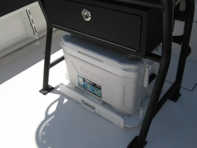 Slide: The Image of Igloo cooler under console of 2025 Edgewater 208 WATCHMAN CC boat. - 6