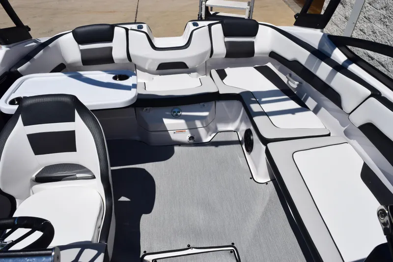 Slide: The Image of 2025 Yamaha Boats AR195 interior with sleek seating and modern design. - 10