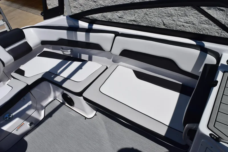 Slide: The Image of 2025 Yamaha Boats AR195 interior seating with sleek, modern design and comfortable upholstery. - 11