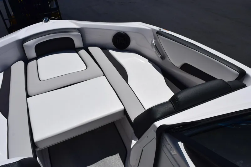 Slide: The Image of 2025 Yamaha Boats AR195 interior seating with sleek, modern design and comfortable upholstery. - 13