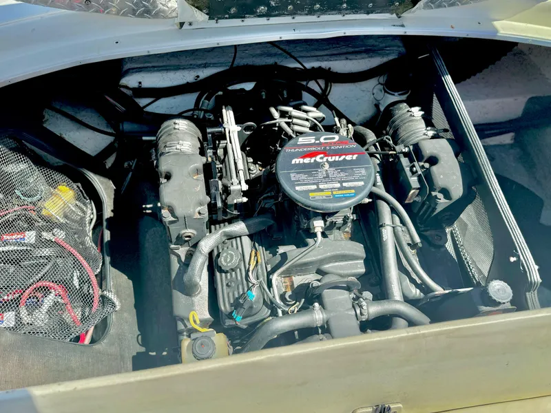 Slide: The Image of 1998 VIP Vixen engine compartment with MerCruiser 5.0 motor, detailed view. - 21