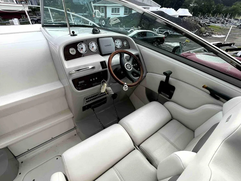 Slide: The Image of 2007 Chaparral 275 SSi boat interior with steering wheel and dashboard controls. - 17