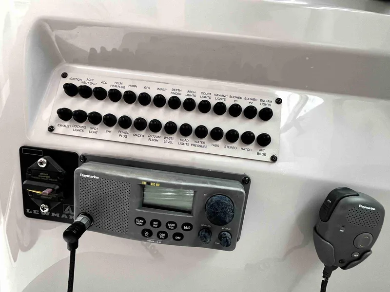 Slide: The Image of Control panel of 2007 Chaparral 275 SSi boat with radio and switches. - 24