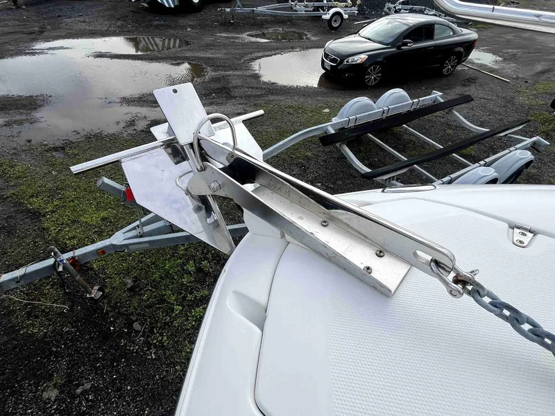 Slide: The Image of 2007 Chaparral 275 SSi boat trailer hitch in a parking lot. - 30