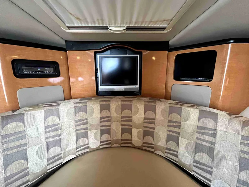 Slide: The Image of Interior of 2007 Chaparral 275 SSi boat with TV and patterned seating. - 33
