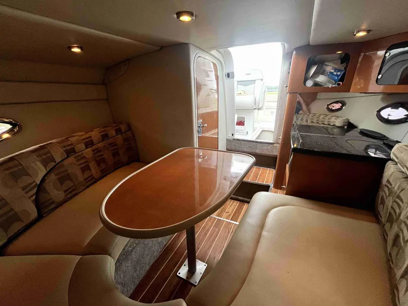 Slide: The Image of Interior of 2007 Chaparral 275 SSi boat with seating and table. - 34