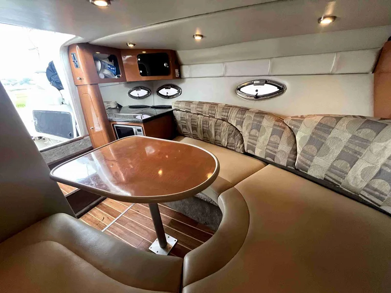 Slide: The Image of 2007 Chaparral 275 SSi boat interior with cozy seating and dining area. - 35