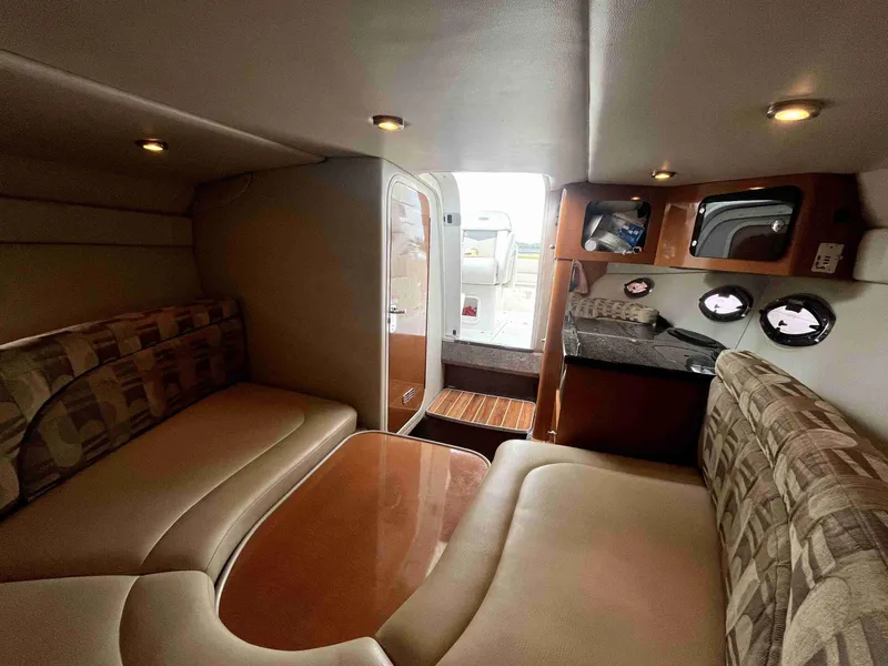Slide: The Image of Interior of 2007 Chaparral 275 SSi boat with seating and kitchenette. - 40