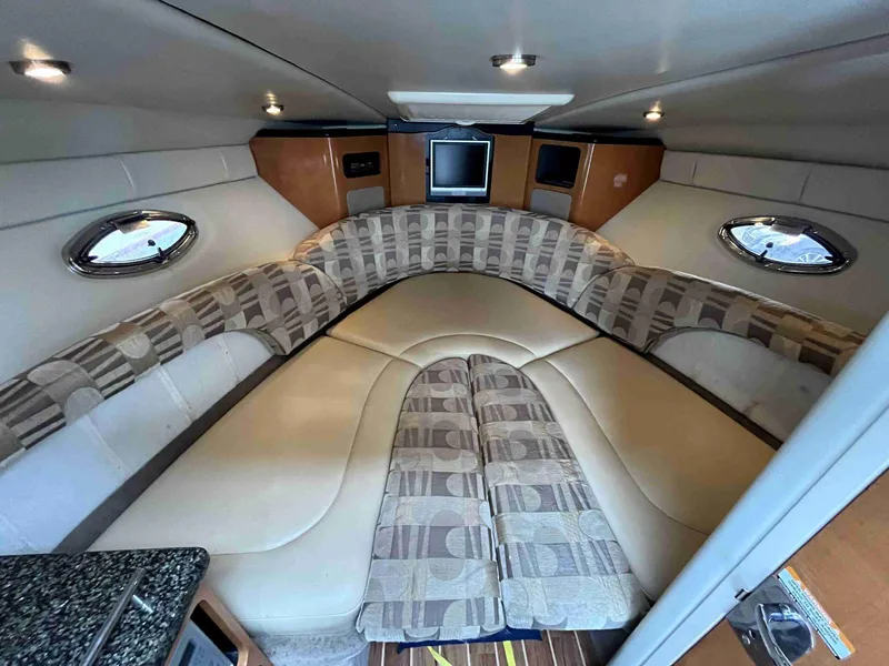 Slide: The Image of Luxurious interior of 2007 Chaparral 275 SSi boat with plush seating and modern amenities. - 41