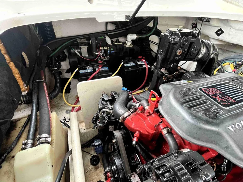 Slide: The Image of Engine compartment of 2007 Chaparral 275 SSi boat, featuring Volvo Penta components. - 47