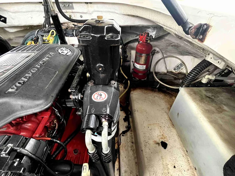 Slide: The Image of Engine compartment of 2007 Chaparral 275 SSi with Volvo Penta engine and fire extinguisher. - 48