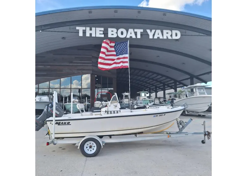Slide: The Image of Chaparral Vector 203 boat, 2016 model, displayed at The Boat Yard with American flag. - 3