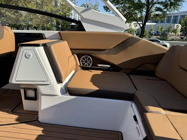 Slide: The Image of 2024 Yamaha Boats 252S interior with tan seating and modern design. - 5