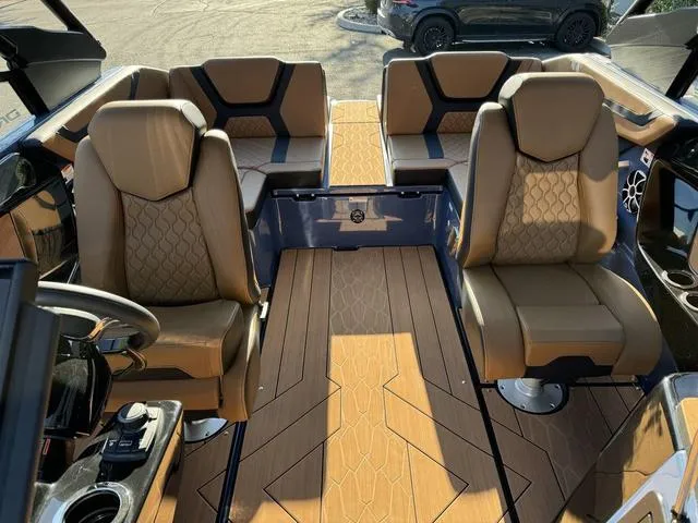 Slide: The Image of 2024 Yamaha Boats 222XD interior with luxurious seating and modern design. - 4