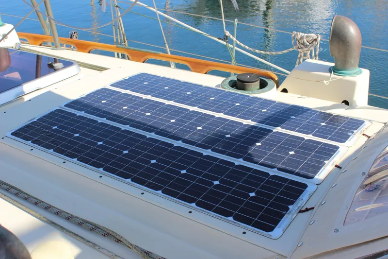 Slide: The Image of Solar panels on 2012 Custom Gartside Jespersen 40 yacht deck, harnessing renewable energy. - 10