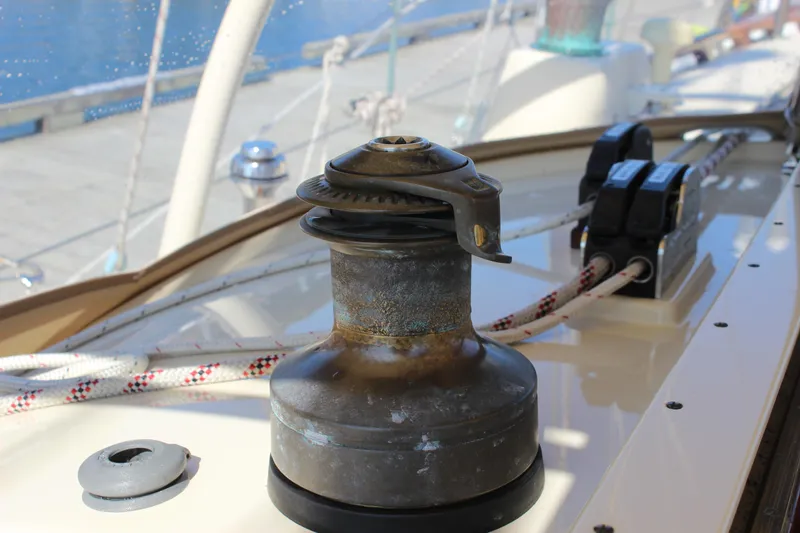 Slide: The Image of Winch on 2012 Custom Gartside Jespersen 40 sailboat deck, with ropes and cleats. - 28