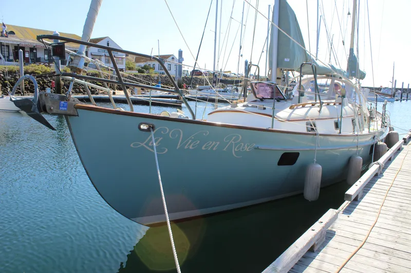 Slide: The Image of Custom Gartside Jespersen 40 sailboat docked, 2012 model, named "La Vie en Rose." - 3