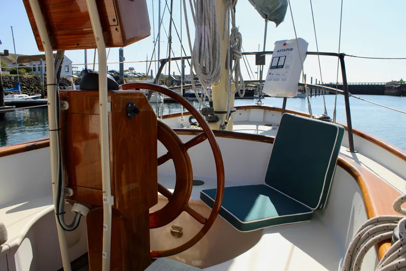 Slide: The Image of Cockpit of 2012 Custom Gartside Jespersen 40 sailboat with wooden wheel and seating. - 34