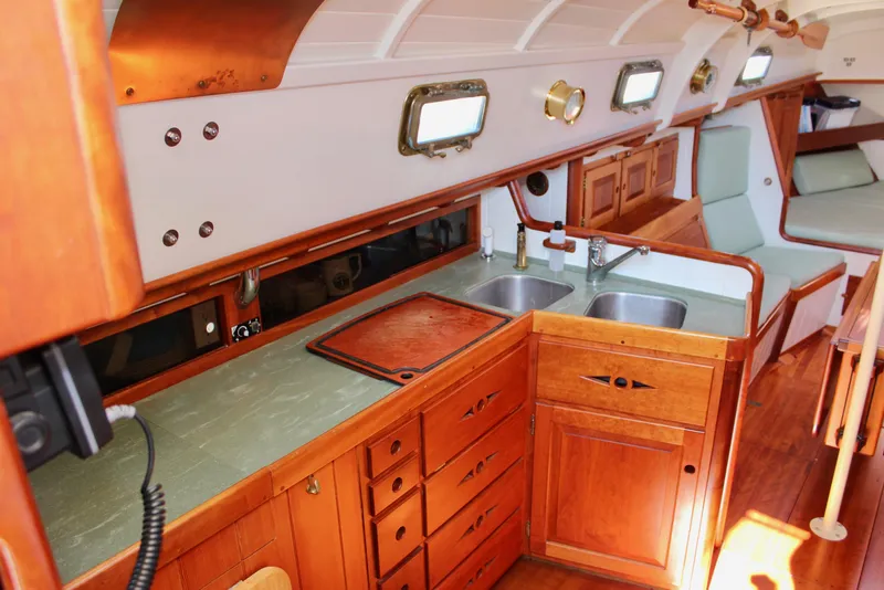 Slide: The Image of Interior of 2012 Custom Gartside Jespersen 40 yacht with wooden cabinetry and dual sinks. - 39