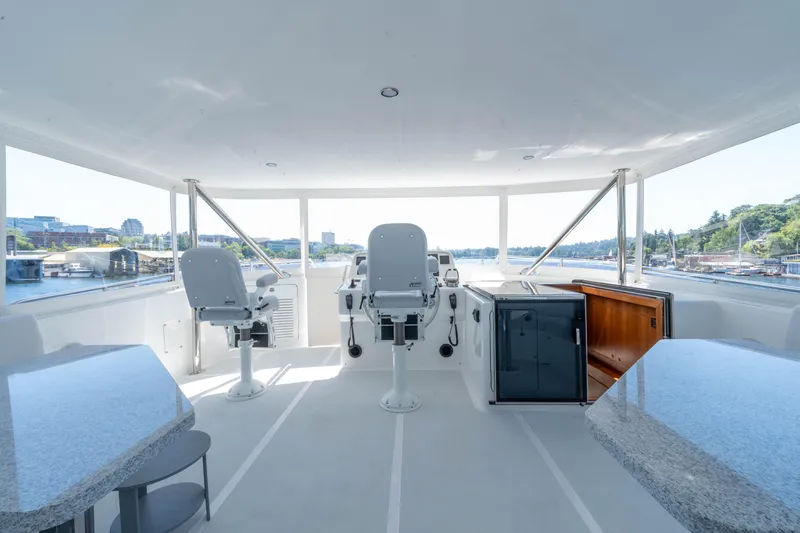 Slide: The Image of Spacious helm area of 2022 Outer Reef Yachts 720 Motoryacht with panoramic views. - 19