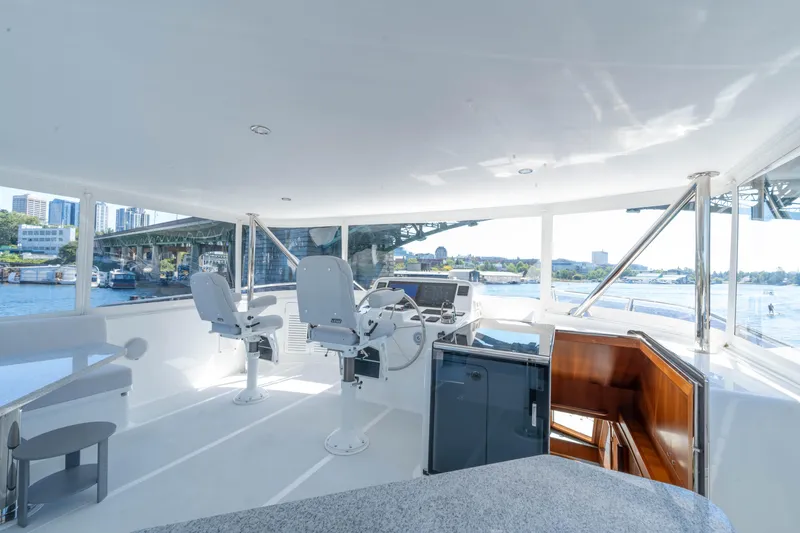 Slide: The Image of Interior helm of 2022 Outer Reef Yachts 720 Motoryacht with panoramic views. - 20