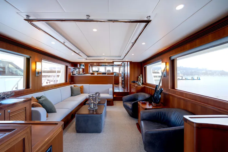 Slide: The Image of Luxurious interior of 2022 Outer Reef Yachts 720 Motoryacht with elegant seating and large windows. - 27