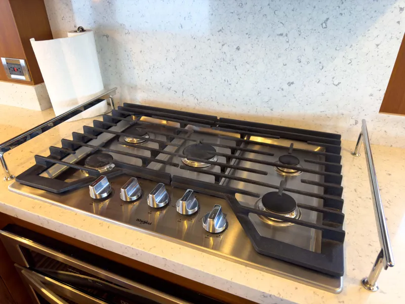 Slide: The Image of Stainless steel stovetop in 2022 Outer Reef Yachts 720 Motoryacht kitchen. - 35