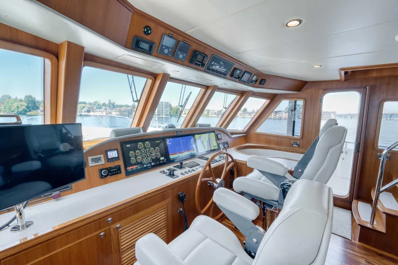 Slide: The Image of Luxurious helm of 2022 Outer Reef Yachts 720 Motoryacht with advanced navigation systems. - 39