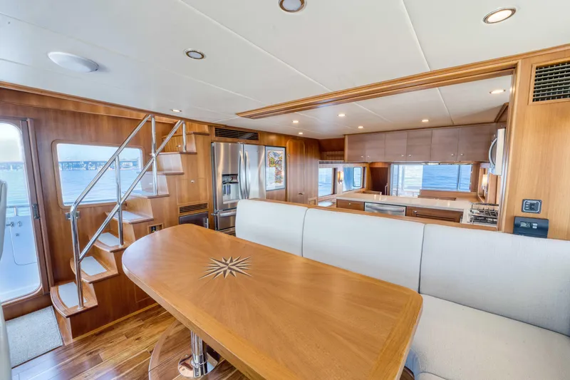 Slide: The Image of Luxurious interior of 2022 Outer Reef Yachts 720 Motoryacht with modern kitchen and dining area. - 41