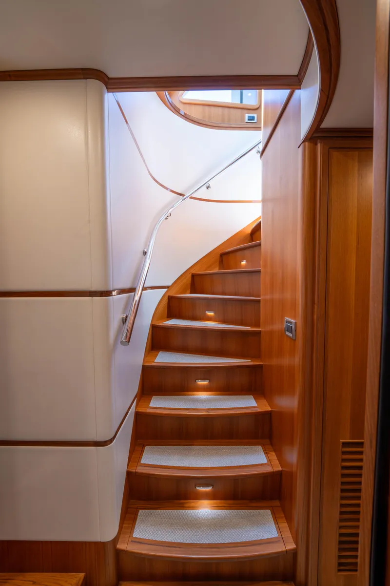 Slide: The Image of Elegant wooden staircase in 2022 Outer Reef Yachts 720 Motoryacht interior. - 42