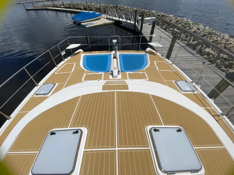 Slide: The Image of 2007 Manta 44 Power Cat deck with hatches and water view. - 12