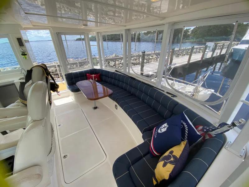 Slide: The Image of Interior of 2007 Manta 44 Power Cat with plush seating and scenic water view. - 24