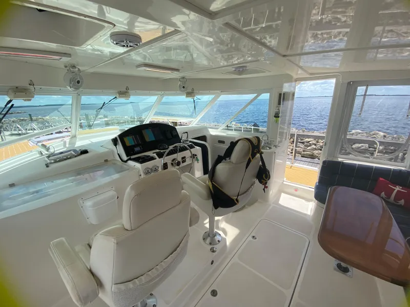 Slide: The Image of Interior of 2007 Manta 44 Power Cat with ocean view through large windows. - 26