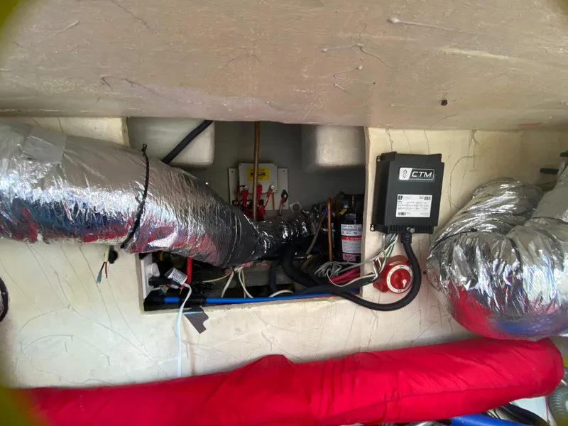 Slide: The Image of Engine compartment of 2007 Manta 44 Power Cat with insulated ducts and wiring. - 32