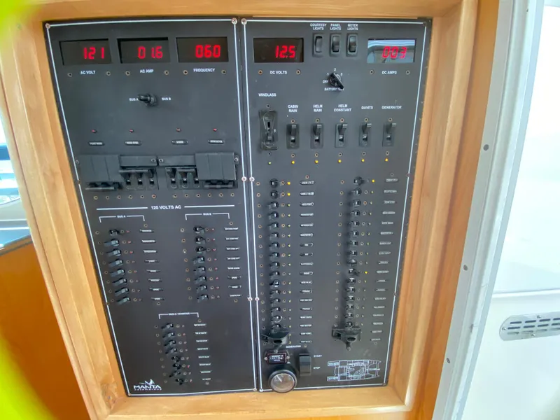 Slide: The Image of Electrical control panel on a 2007 Manta 44 Power Catamaran. - 35