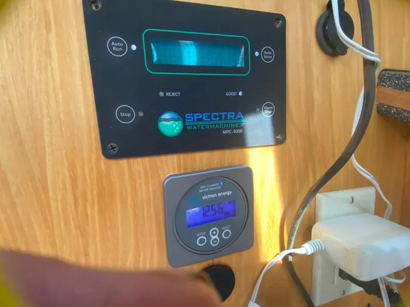 Slide: The Image of Control panel on 2007 Manta 44 Power Cat with Spectra Watermaker and Victron Energy display. - 40