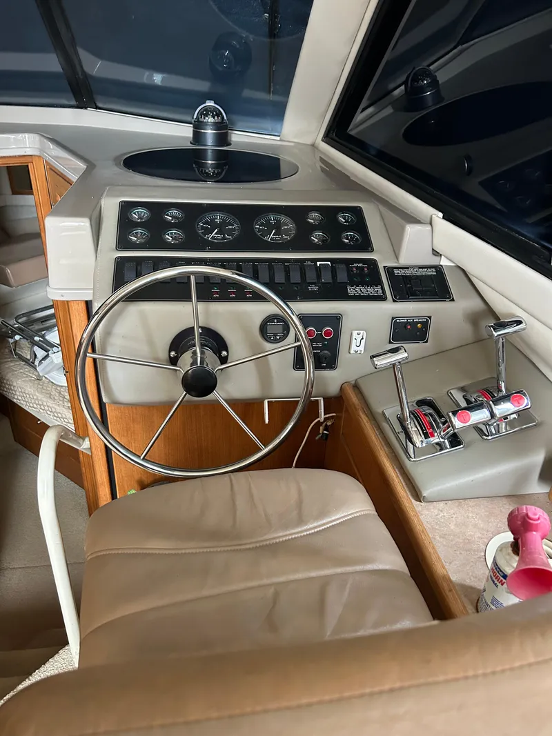 Slide: The Image of Interior helm of 2000 Bayliner 4087 Motoryacht with steering wheel and control panel. - 9