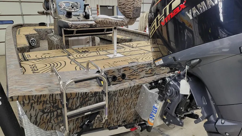 Slide: The Image of 2025 Xpress H22 Bay boat with Yamaha Vmax 175 SHO engine, camo design, in stock. - 15