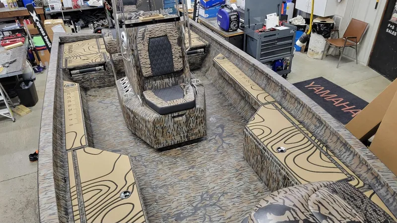 Slide: The Image of 2025 Xpress H22 Bay boat interior with Yamaha Vmax 175 SHO, camo design, in stock. - 19
