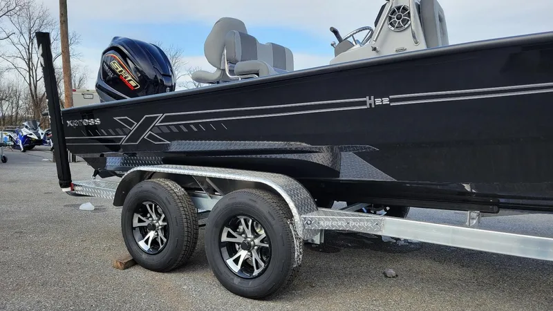 Slide: The Image of 2025 Xpress H22 Bay boat with Yamaha Vmax 200 SHO engine on trailer. - 11
