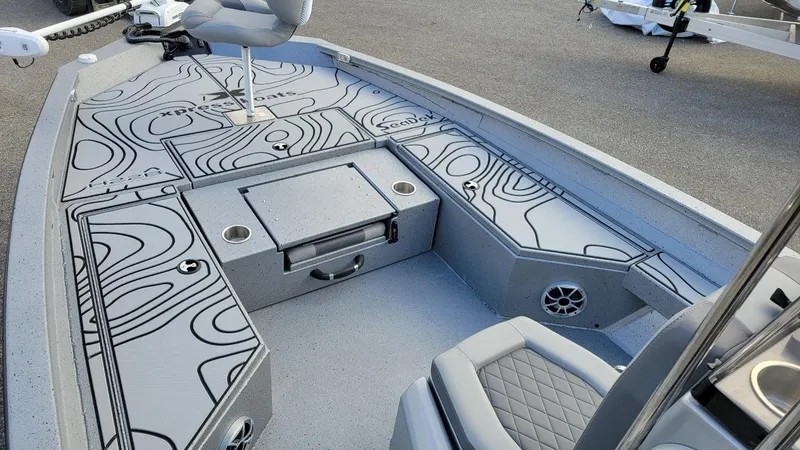 Slide: The Image of 2025 Xpress H22 Bay boat interior with Yamaha Vmax 200 SHO, featuring sleek design and seating. - 14