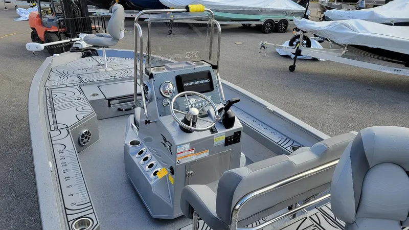 Slide: The Image of 2025 Xpress H22 Bay boat with Yamaha Vmax 200 SHO engine, interior view. - 3