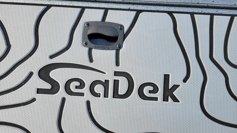Slide: The Image of SeaDek logo on Xpress H22 Bay boat, 2025 model with Yamaha Vmax 200 SHO. - 4