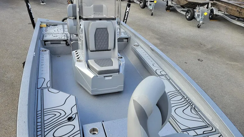 Slide: The Image of 2025 Xpress H22 Bay boat interior with Yamaha Vmax 200 SHO, featuring sleek seating and design. - 6