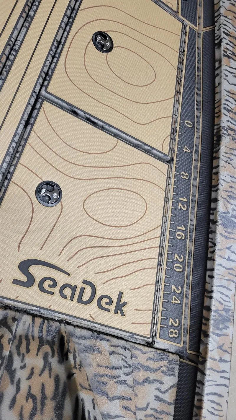 Slide: The Image of SeaDek flooring on 2025 Xpress X19 Pro Bass boat with Yamaha Vmax 200. - 16