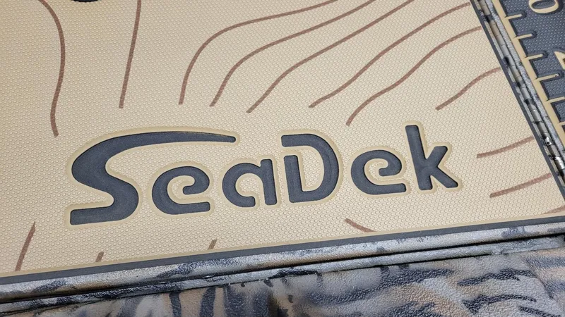 Slide: The Image of SeaDek flooring on 2025 Xpress X19 Pro Bass boat with Yamaha Vmax 200. - 17