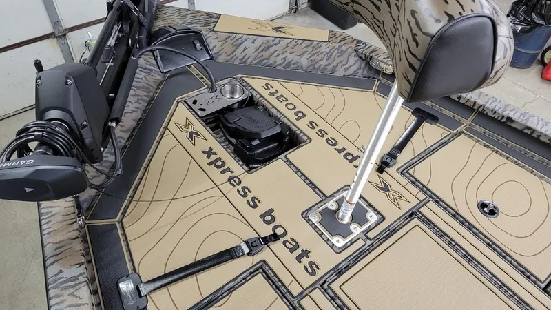 Slide: The Image of 2025 Xpress X19 Pro Bass boat interior with Yamaha Vmax 200, featuring advanced Garmin equipment. - 19