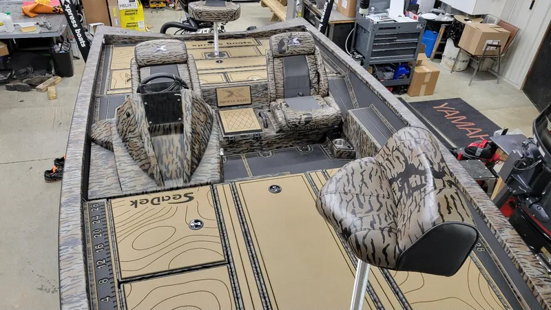Slide: The Image of 2025 Xpress X19 Pro Bass boat interior with Yamaha Vmax 200, camo design, in stock. - 20