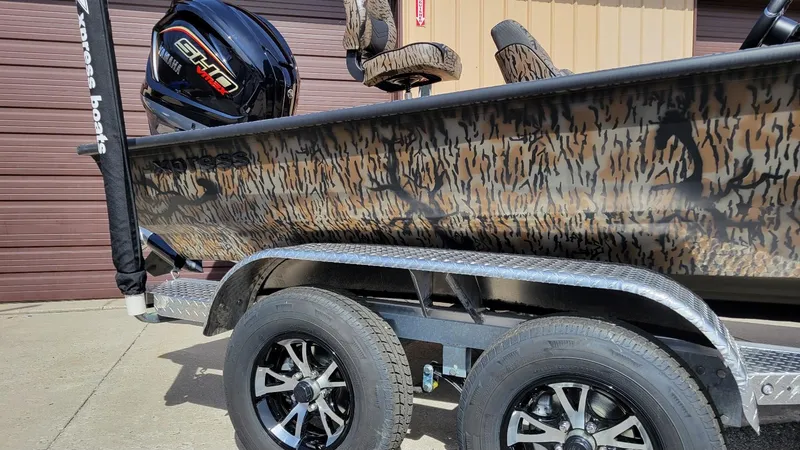 Slide: The Image of 2025 Xpress X19 Pro Bass boat with Yamaha 200 Vmax engine on trailer. - 10
