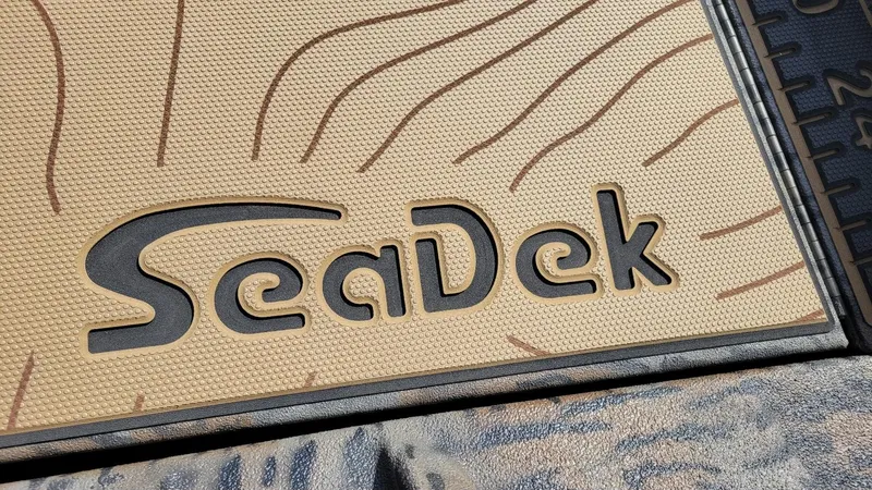 Slide: The Image of SeaDek logo on Xpress X19 Pro Bass boat, 2025 model, featuring Yamaha 200 Vmax. - 14